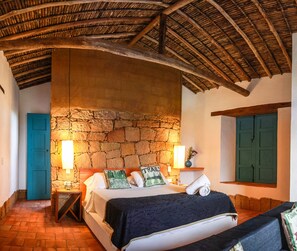 Comfort Triple Room, 1 Bedroom | Bed sheets - Serranía del Viento (Barichara)