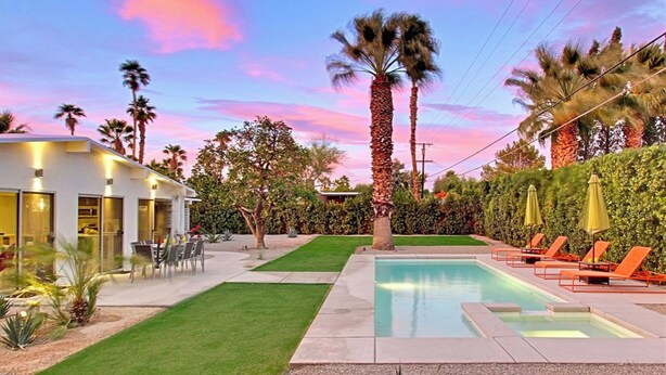 A modern house with a swimming pool, outdoor seating, and a well-maintained garden. - Look to the West ... on Via Miraleste! (Palm Springs)