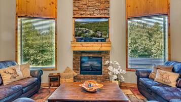 Flat-screen TV, fireplace, video games, DVD player