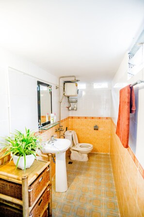 Apartment, 2 Bedrooms | Bathroom | Shower, free toiletries, hair dryer, slippers