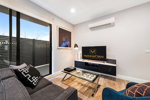 Standard Apartment, 2 Bedrooms | Living area | 42-inch flat-screen TV with satellite channels, LCD TV, DVD player - Manhattan Apartments - Caulfield North (Caulfield North)