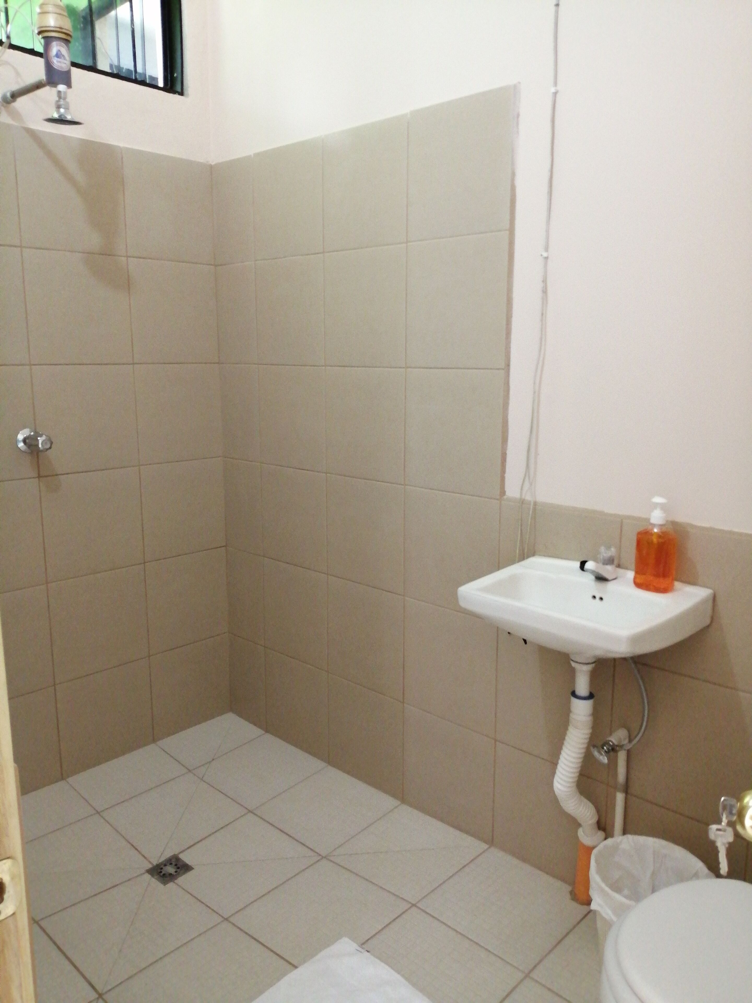 economy double room, 2 double beds, non smoking, ensuite | bathroom | shower, rainfall showerhead, free toiletries, hair dryer