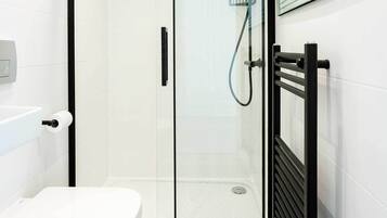 Bathtub, hair dryer, towels