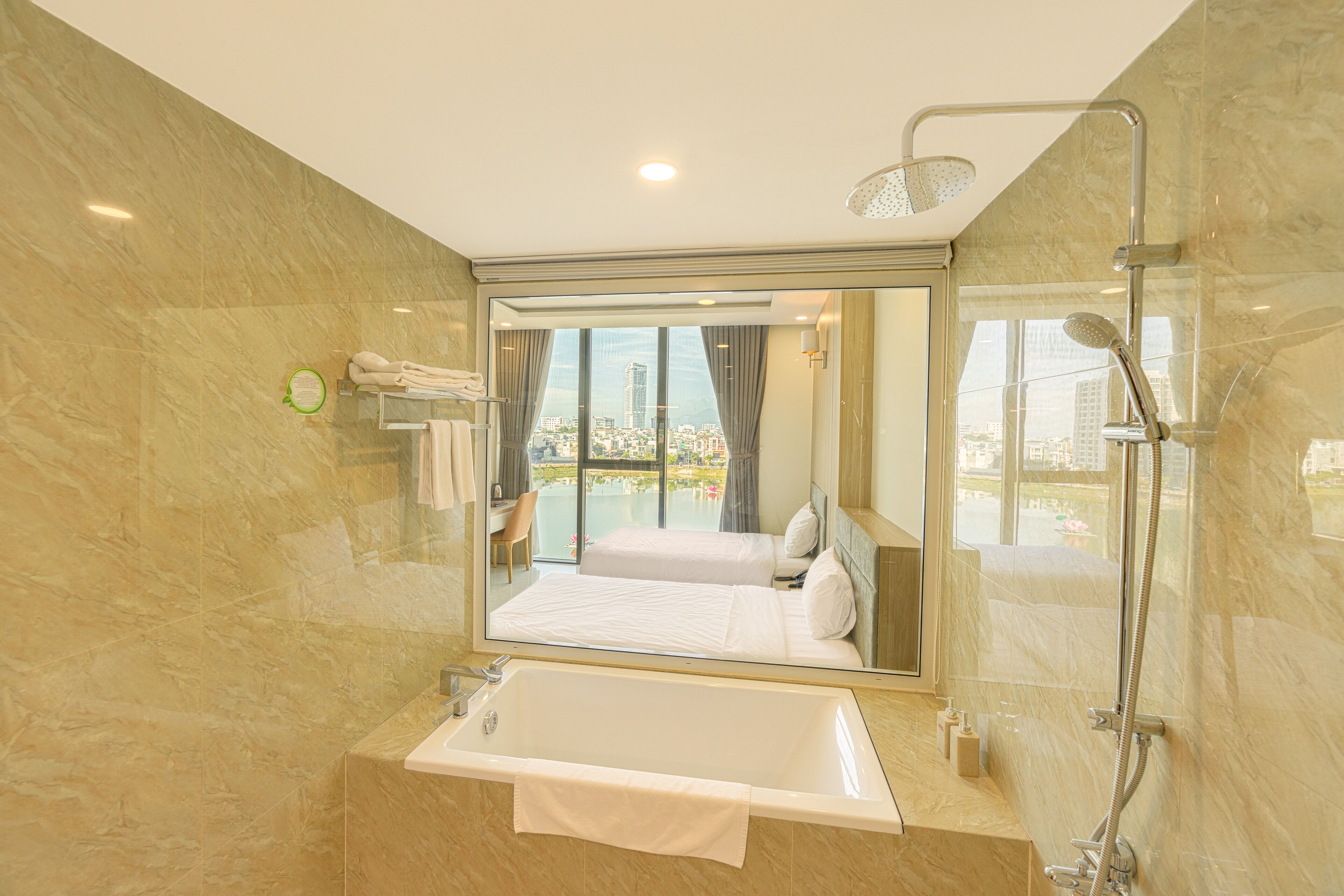 deluxe room, lake view | bathroom | free toiletries, hair dryer, bathrobes, slippers