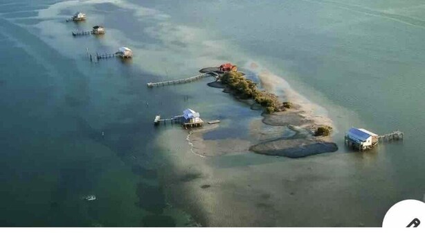 An aerial view of a coastal area with several small islands connected by bridges. - NEW!!  The “WATERSIDE” COTTAGE~With dockage (Bokeelia)
