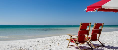 On the beach, sun loungers