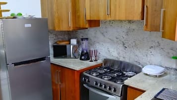 Exclusive Apartment, 3 Bedrooms, Non Smoking | Private kitchen | Full-size fridge, microwave, oven, stovetop