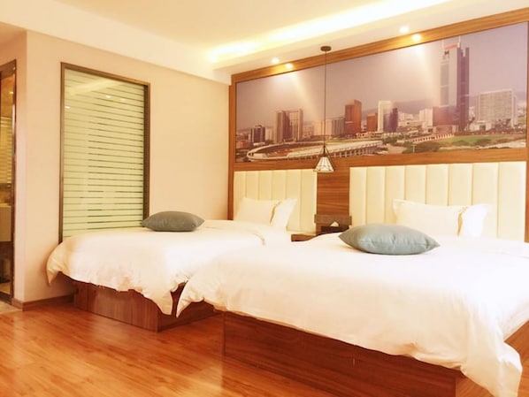 Executive Twin Room | Desk, blackout drapes, free WiFi