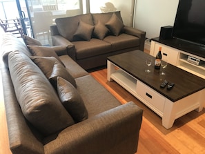 Executive Apartment, 2 Bedrooms, Partial Ocean View | Living room