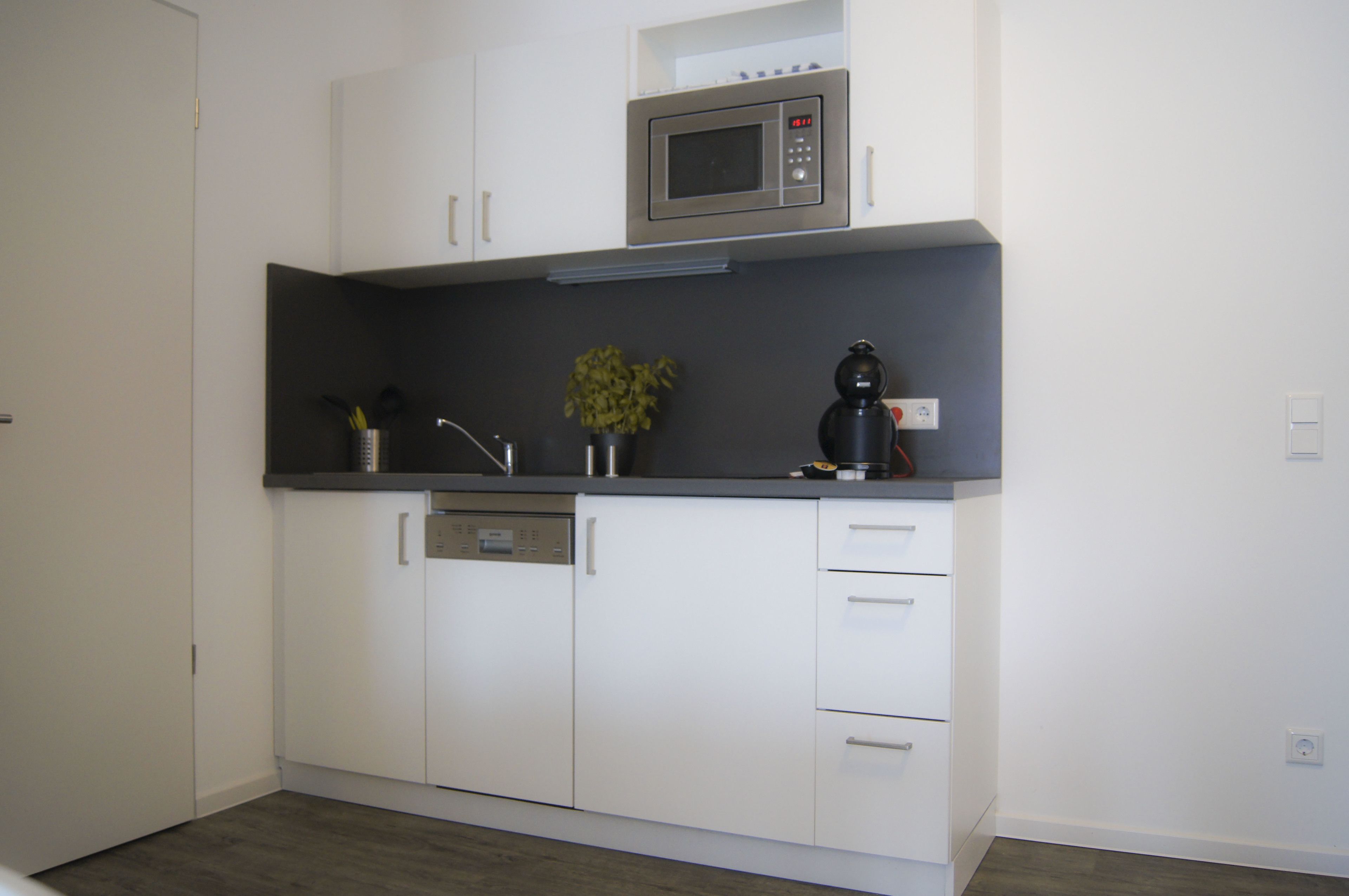 microwave, stovetop, dishwasher, electric kettle