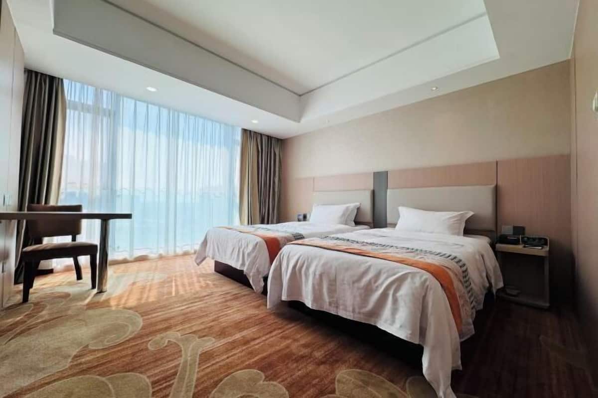 Desk, blackout curtains, iron/ironing board (on request), rollaway beds