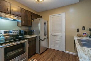Fridge, microwave, oven, stovetop - Helen Riverfront 1BR 1BA Condo | Balcony Overlooking River | Downtown Helen (Helen)