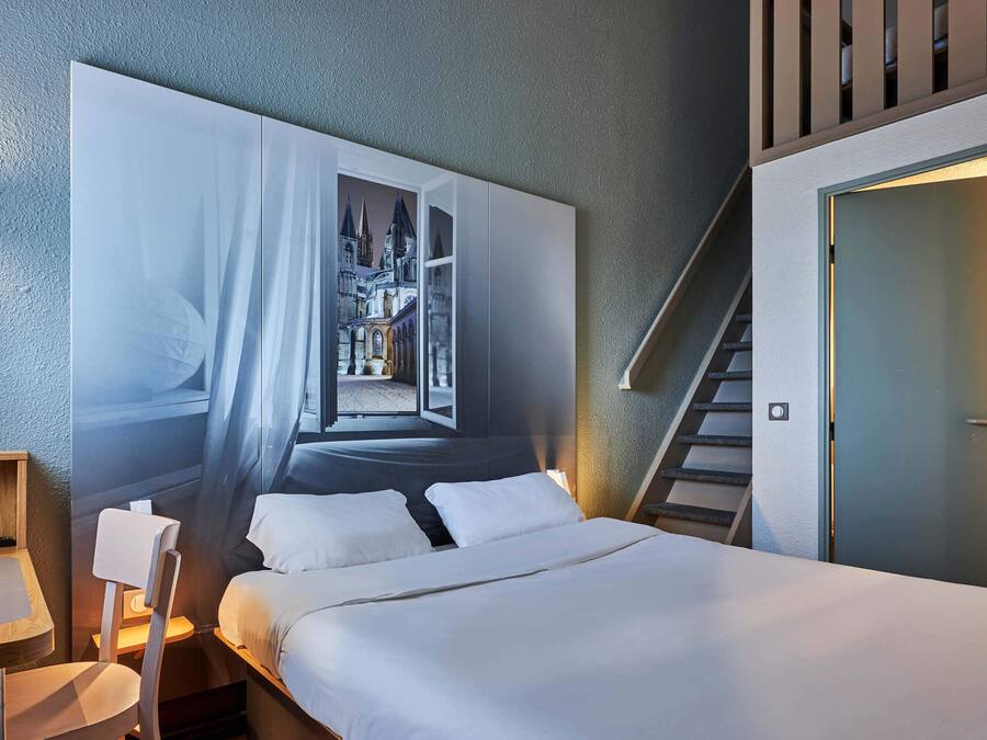 Chambre quadruple, non-fumeur | Bureau, rideaux d’obscurcissement, système d’insonorisation