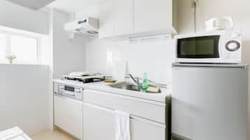 Private Vacation Home, 2 Bedrooms | Private kitchen | Fridge, microwave, stovetop, electric kettle
