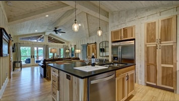 Vaulted ceilings with an open floor plan.