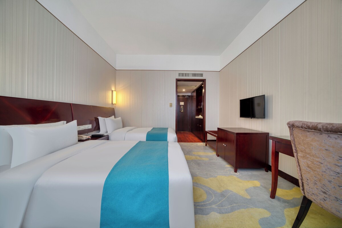 Premium bedding, down duvets, memory-foam beds, minibar