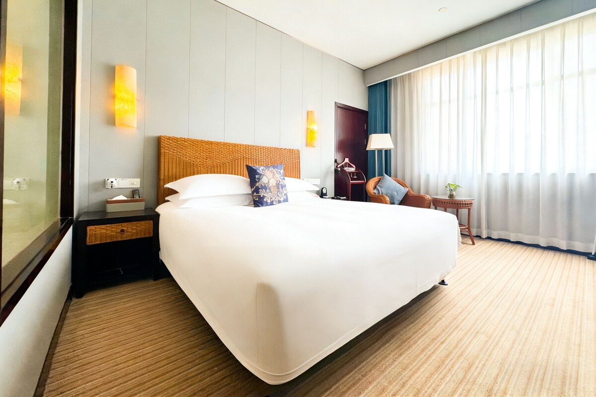 Premium bedding, down duvets, memory-foam beds, minibar