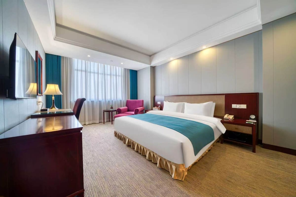 Suite ejecutiva, vistas a la ciudad | Ropa de cama de alta calidad y edredones de plumas