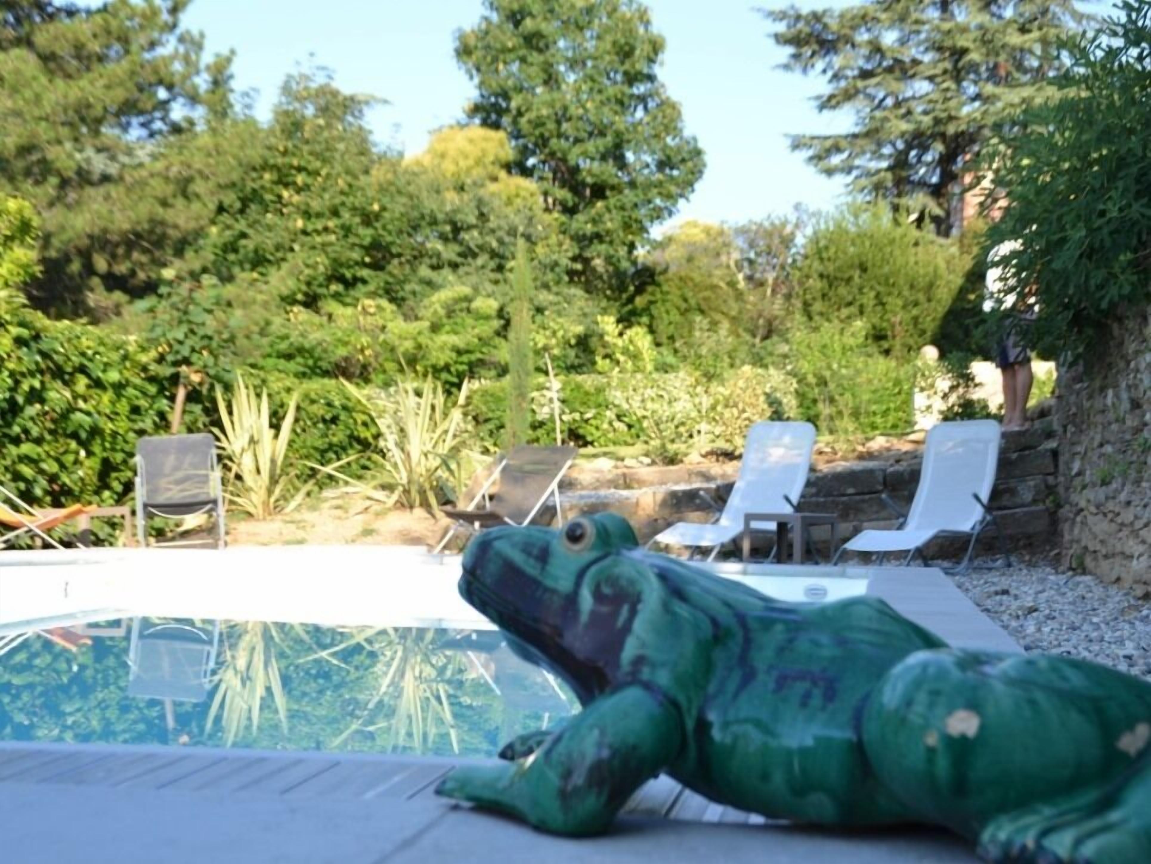 Outdoor pool, a heated pool, sun loungers