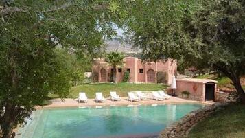 Outdoor pool, pool umbrellas, pool loungers