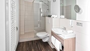 Shower, rainfall showerhead, hair dryer, towels