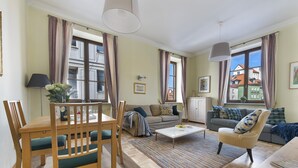 Comfort Apartment | Living room | Flat-screen TV - P&O Apartments Podwale 4 (Warsaw)
