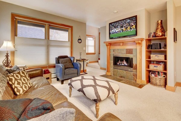 Living room - fireplace, comfortable seating, and flatscreen TV