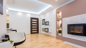 Appartamento Comfort | Area soggiorno | TV a schermo piatto