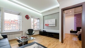 Appartamento Comfort | Area soggiorno | TV a schermo piatto