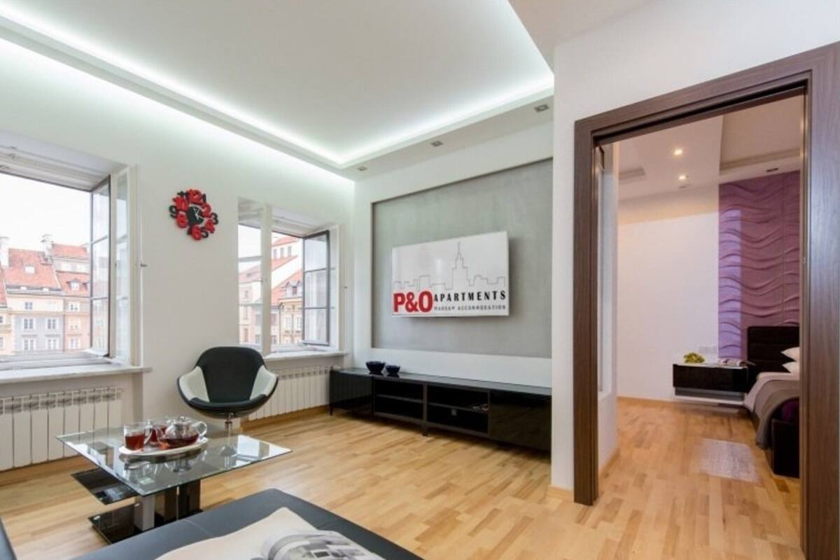 Departamento Confort | Área de sala de estar | Televisión de pantalla plana