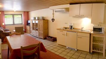 Apartment, 1 Bedroom, Terrace, Garden View (Rotling) | Private kitchen | Full-size fridge, microwave, stovetop, coffee/tea maker