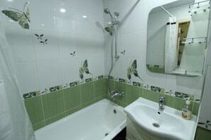 Apartment | Bathroom | Combined shower/bathtub, deep-soaking bathtub, free toiletries - Flats of Moscow Apartment on Yuzhnaya (Moscow)