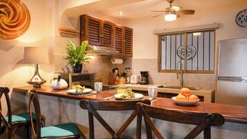 Fridge, microwave, coffee/tea maker, toaster