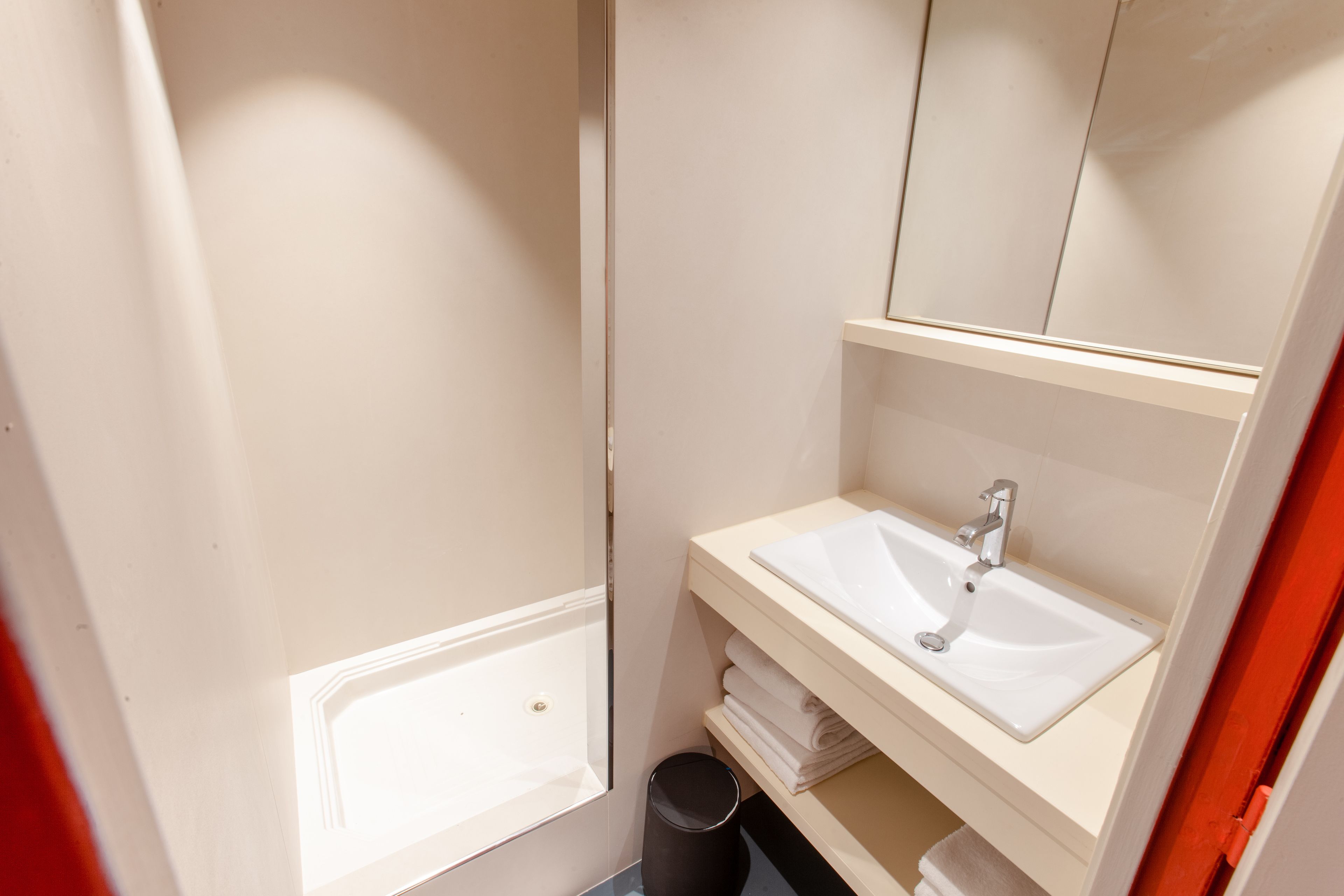 hair dryer, bathrobes, slippers, towels