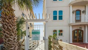A gated entrance to a building with a sign indicating private access for owners and guests. - 2min Walk to Private Beach! 3BR Gorgeous Townhome! (Miramar Beach)