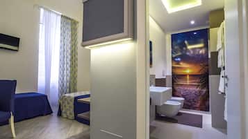 Exclusive Quadruple Room, Private Bathroom, City View | Memory-foam beds, minibar, in-room safe, desk