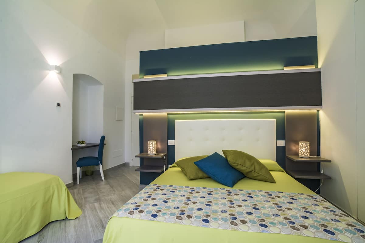 Exclusive Triple Room, Private Bathroom, Garden View | Memory-foam beds, minibar, in-room safe, desk