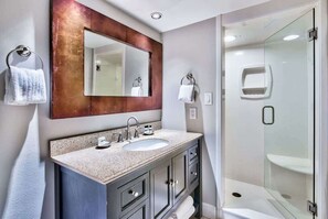 Bathtub, hair dryer, towels, soap