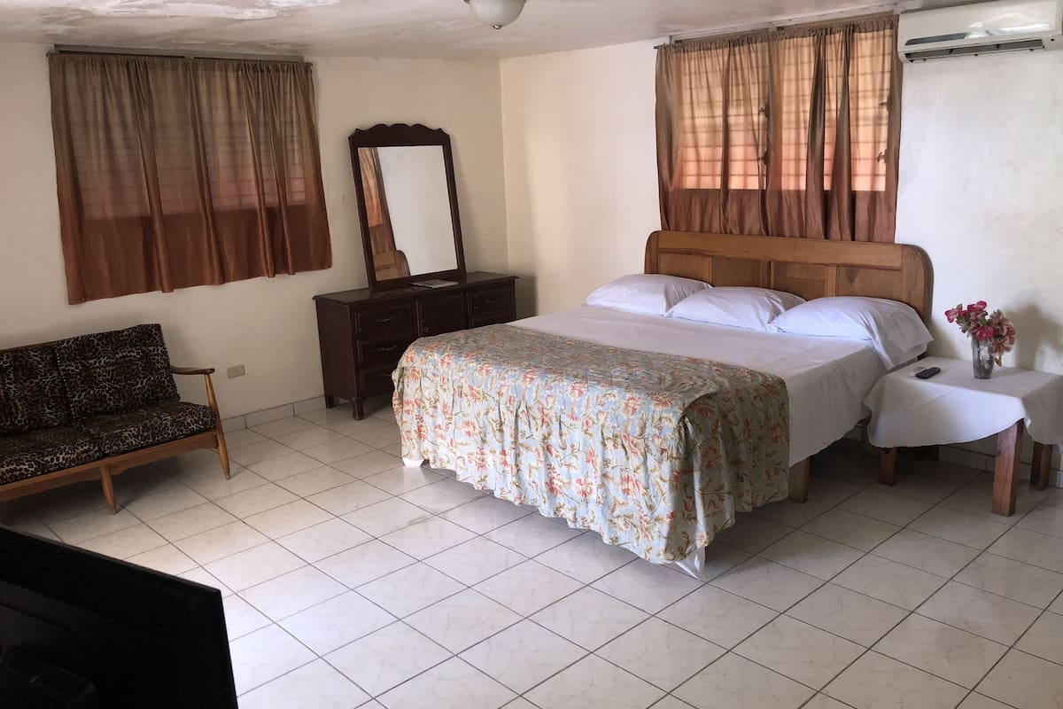 signature suite, 1 king bed, terrace, pool view | iron/ironing board, free wifi