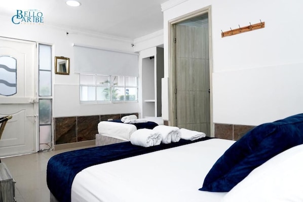 Desk, blackout drapes, bed sheets