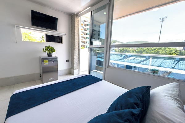 Superior tweepersoonskamer, balkon | Een bureau, verduisterende gordijnen, beddengoed
