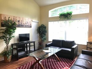 Apartment, 4 Bedrooms | Living area | TV - Emerald Island Resort (Kissimmee)