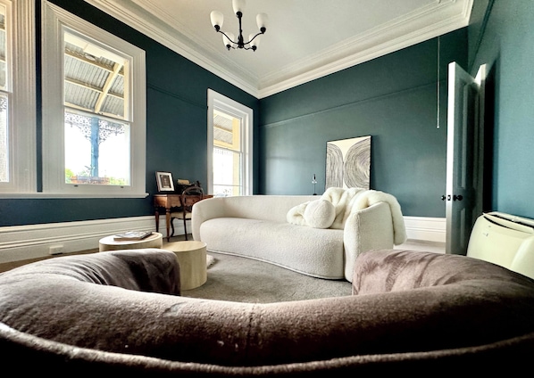 Classic Townhome, 2 Bedrooms, Balcony, City View | Living area | Flat-screen TV