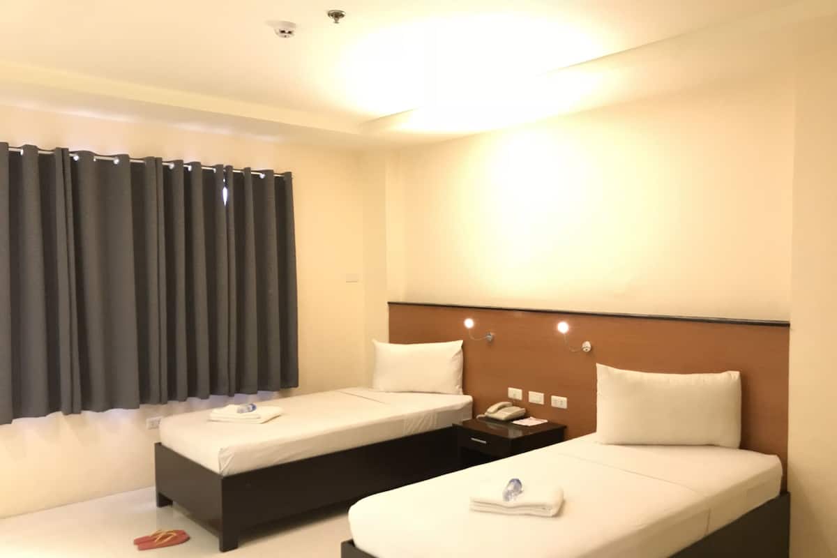 Chambre Deluxe avec lits jumeaux, 2 lits une place