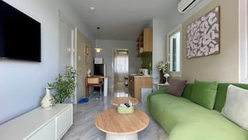 Business Room, 1 Bedroom, City View, Tower | Living area | 43-inch Smart TV with digital channels