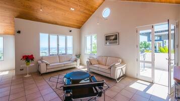 Luxury Villa, Multiple Beds, Ocean View | Living room | Flat-screen TV