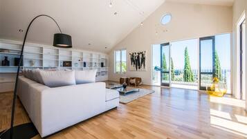 Luxury Villa, Multiple Beds, Ocean View | Living room | Flat-screen TV