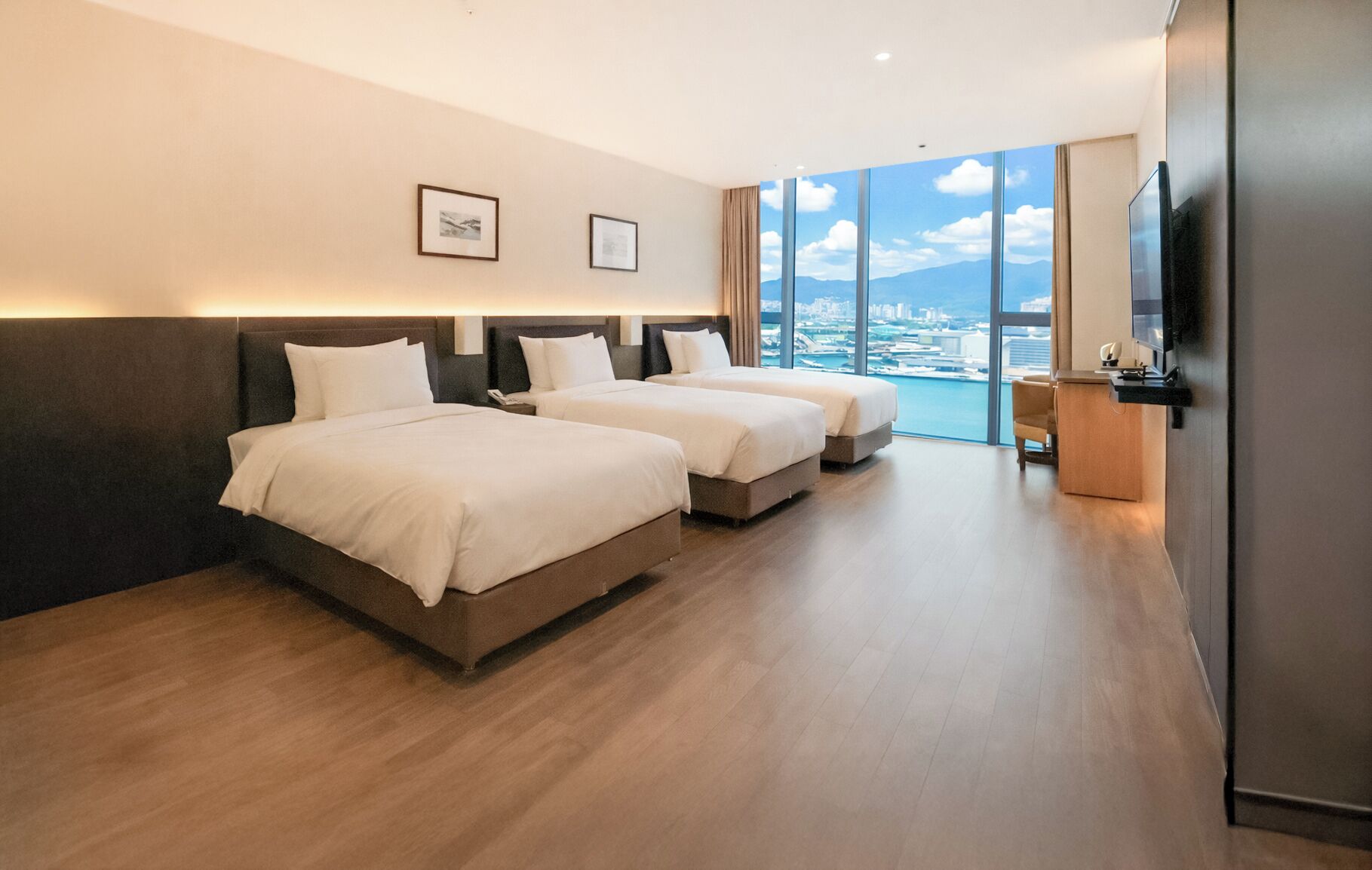 Deluxe Family Triple Room, Ocean View | Individually decorated, individually furnished, blackout curtains