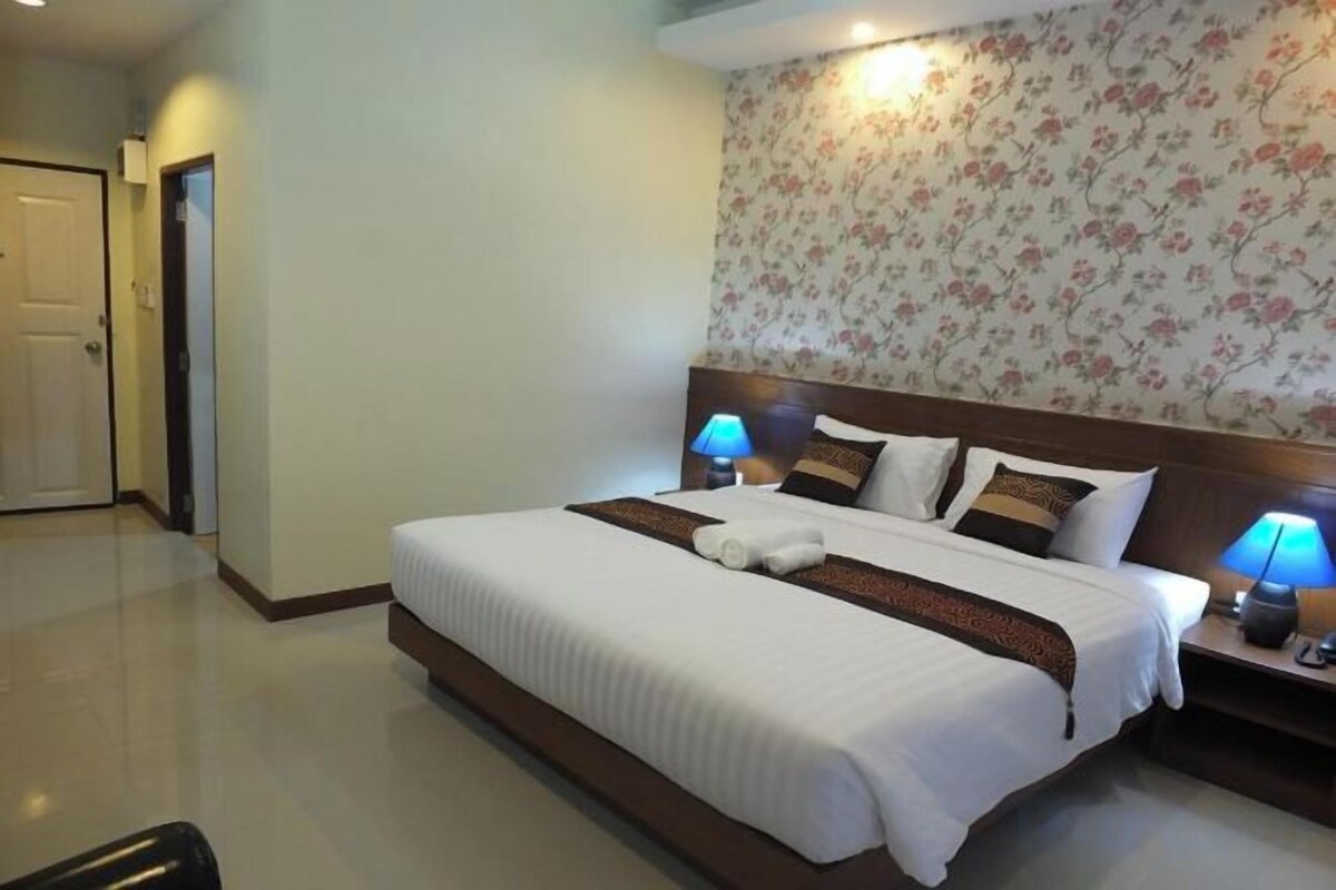 Desk, blackout drapes, rollaway beds (surcharge), WiFi (free)
