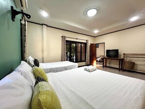 Habitación doble familiar | Wifi gratis y ropa de cama 